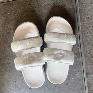 Nike fuzzy slides